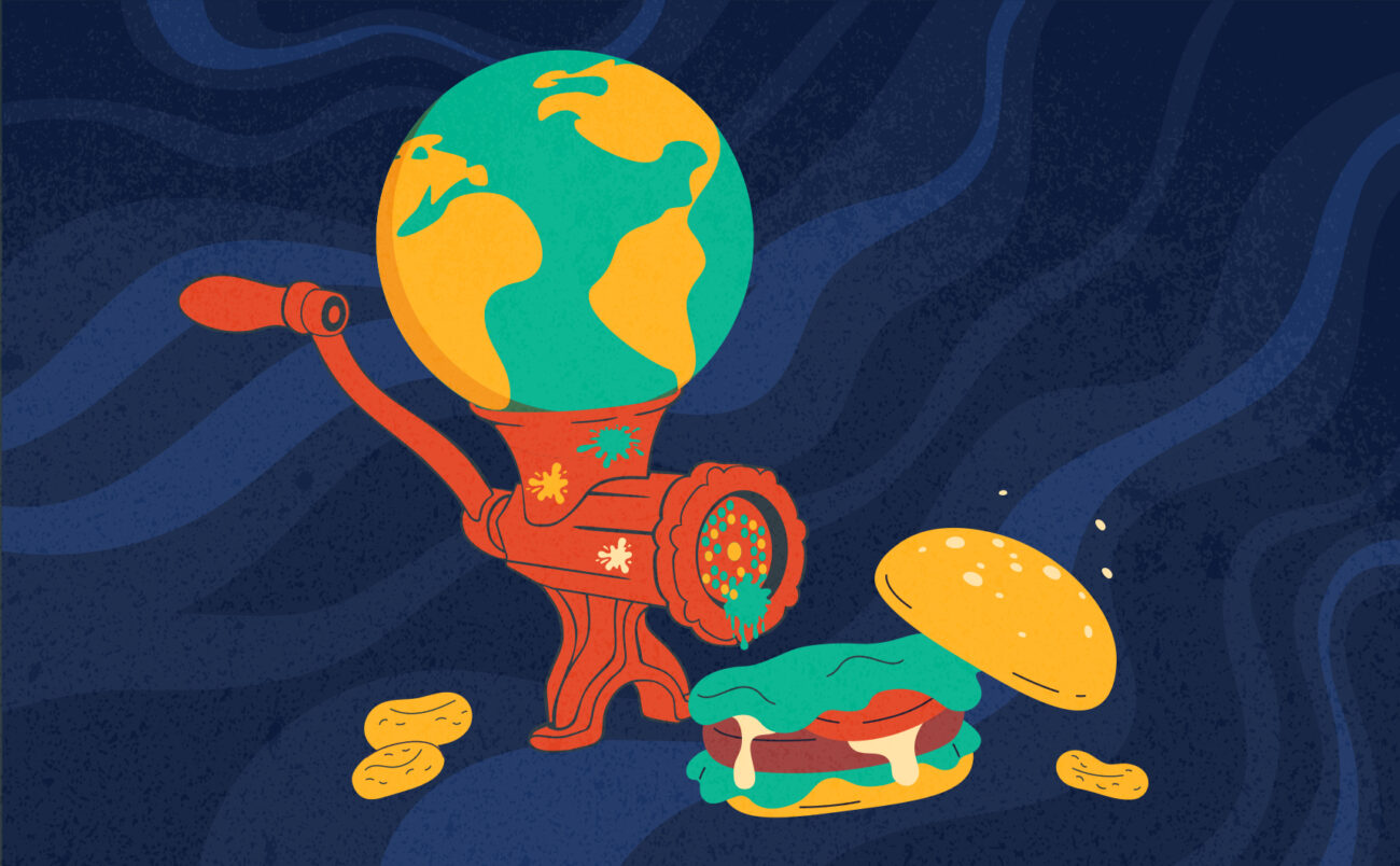 Monde broyé par une machine à viande donnant un hamburger